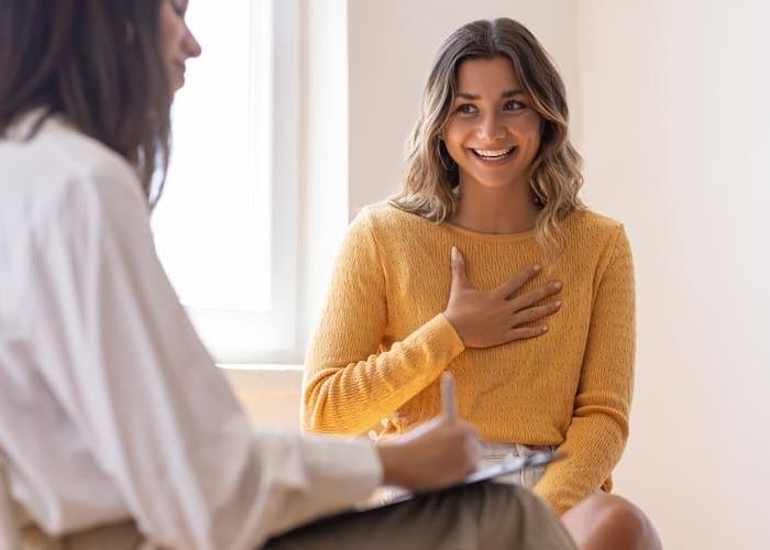 Psychologist listening to her patient