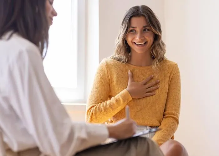 Psychologist listening to her patient