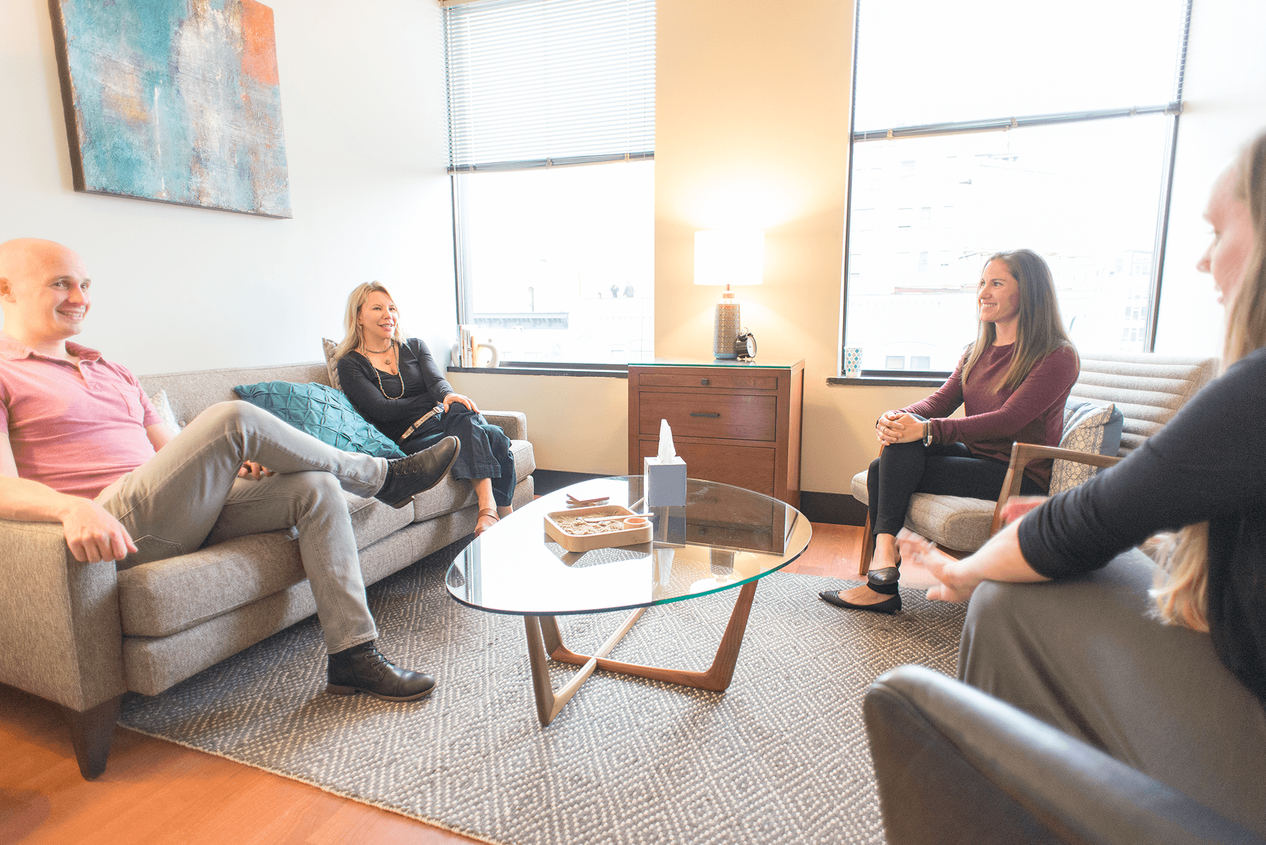 people sitting together enjoying a therapy session your first therapy appointment